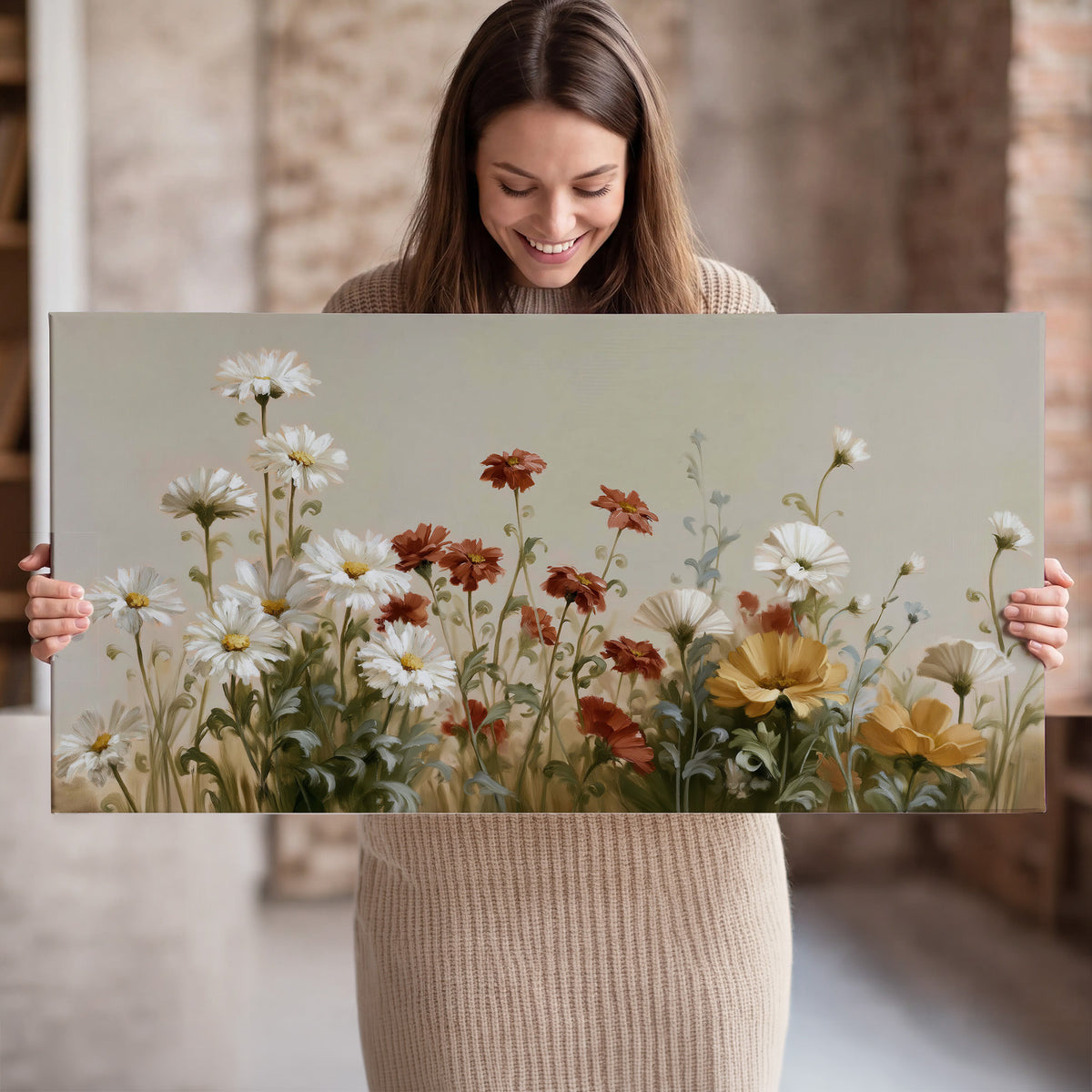 White wildflowers and warm red blossoms rising against a soft beige background single canvas wall art held in hands