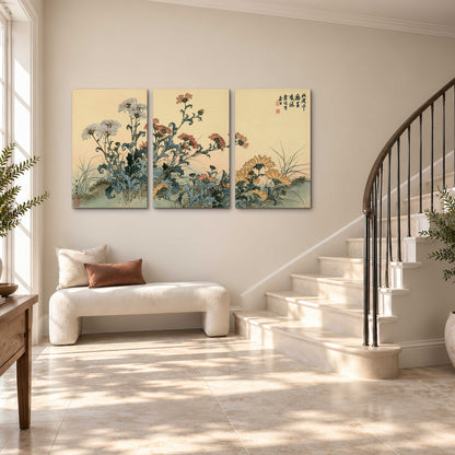 Flowering plants and a butterfly arranged on a warm cream ground with decorative script 3 piece canvas wall art styled in an interior