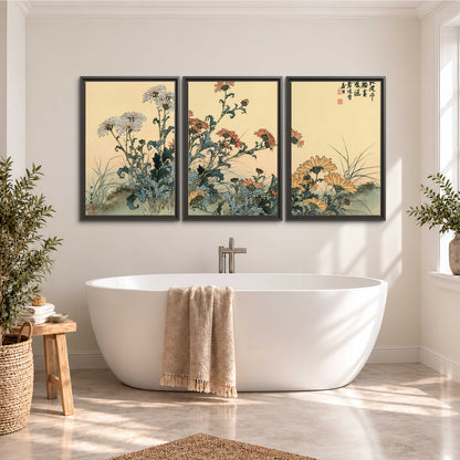 Flowering plants and a butterfly arranged on a warm cream ground with decorative script 3 piece framed canvas wall art styled in an interior