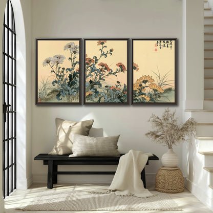 Flowering plants and a butterfly arranged on a warm cream ground with decorative script 3 piece framed canvas wall art displayed in a entryway