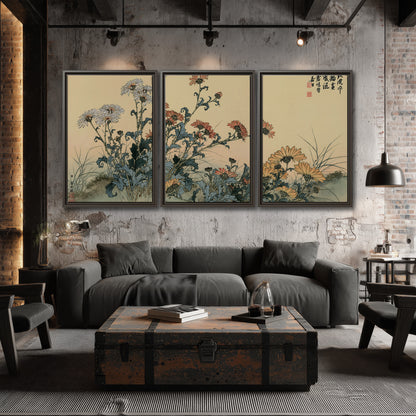 Flowering plants and a butterfly arranged on a warm cream ground with decorative script 3 piece framed canvas wall art displayed in a industrial room