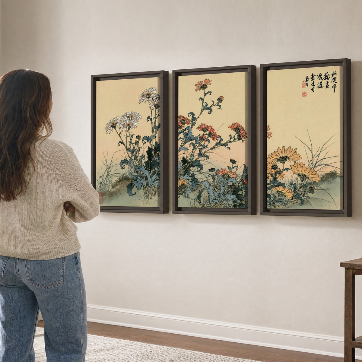 Flowering plants and a butterfly arranged on a warm cream ground with decorative script 3 piece framed canvas wall art three panel arrangement on a wall