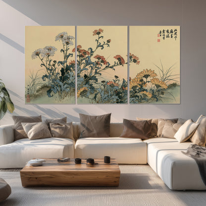 Flowering plants and a butterfly arranged on a warm cream ground with decorative script set of 3 poster prints displayed in a living room