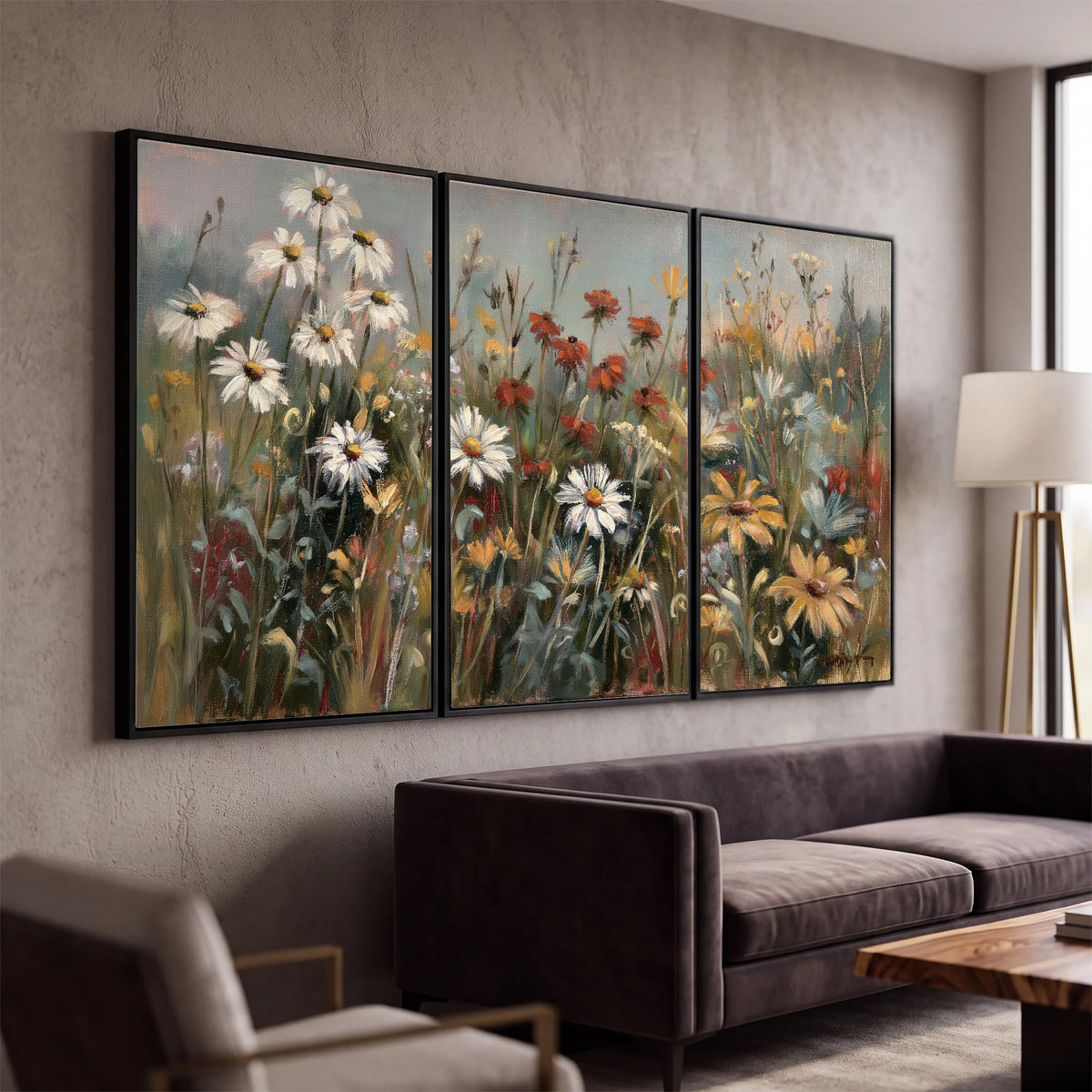 White daisies, rust blooms and long grasses in a softly shadowed meadow 3 piece framed canvas wall art displayed in a modern living room