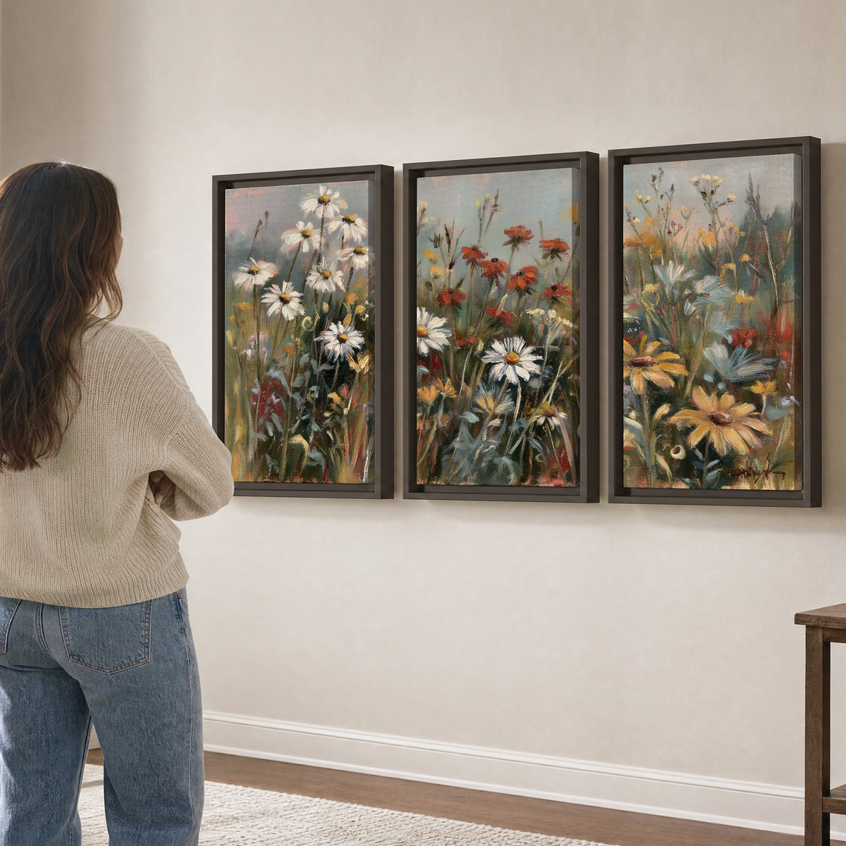 White daisies, rust blooms and long grasses in a softly shadowed meadow 3 piece framed canvas wall art three panel arrangement on a wall