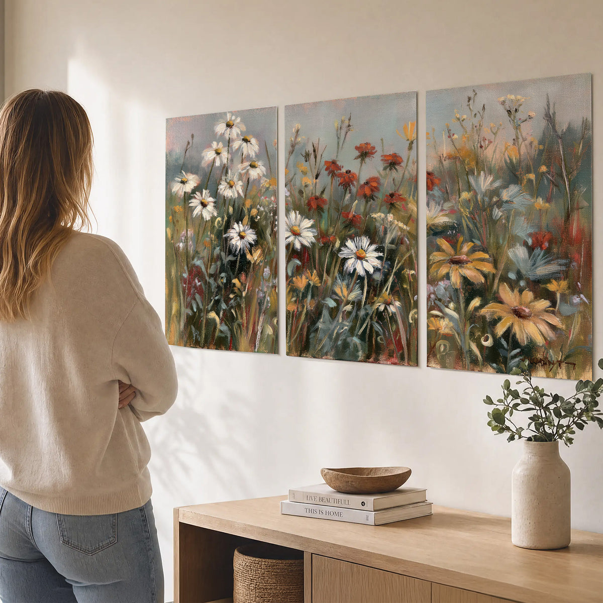 White daisies, rust blooms and long grasses in a softly shadowed meadow set of 3 poster prints three panel arrangement on a wall