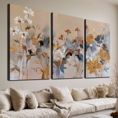 Loose blue and ochre blossoms layered across a warm neutral background 3 piece canvas wall art room and product view