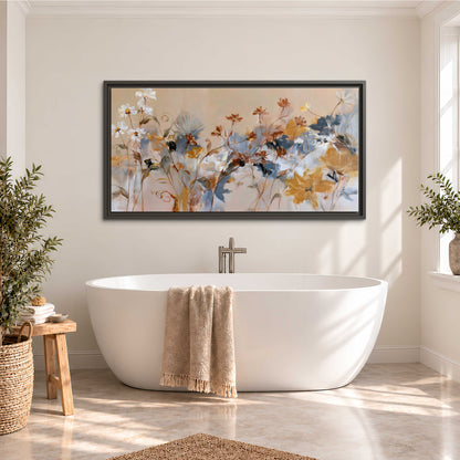 Loose blue and ochre blossoms layered across a warm neutral background single framed canvas wall art styled in an interior