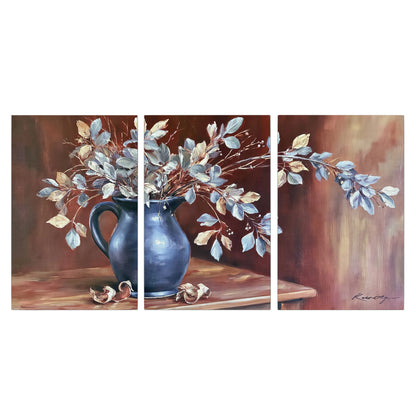 White flowering branches gathered in a deep blue pitcher against a warm rust-colored wall 3 piece canvas wall art viewed straight on