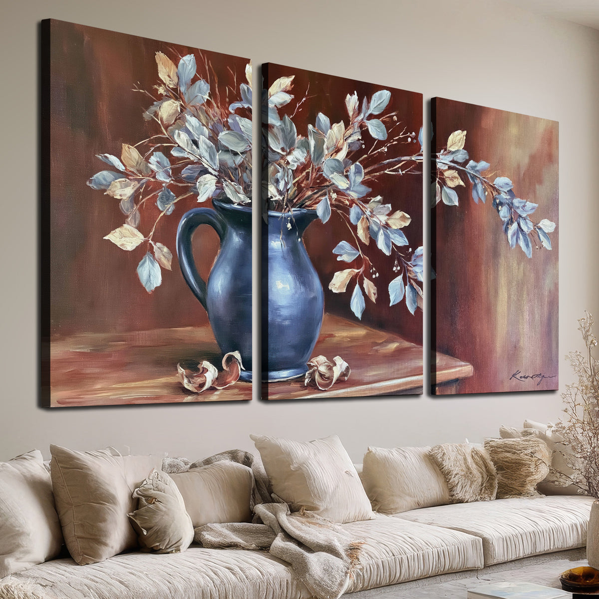 White flowering branches gathered in a deep blue pitcher against a warm rust-colored wall 3 piece canvas wall art room and product view