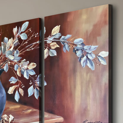 White flowering branches gathered in a deep blue pitcher against a warm rust-colored wall 3 piece canvas wall art room and product view