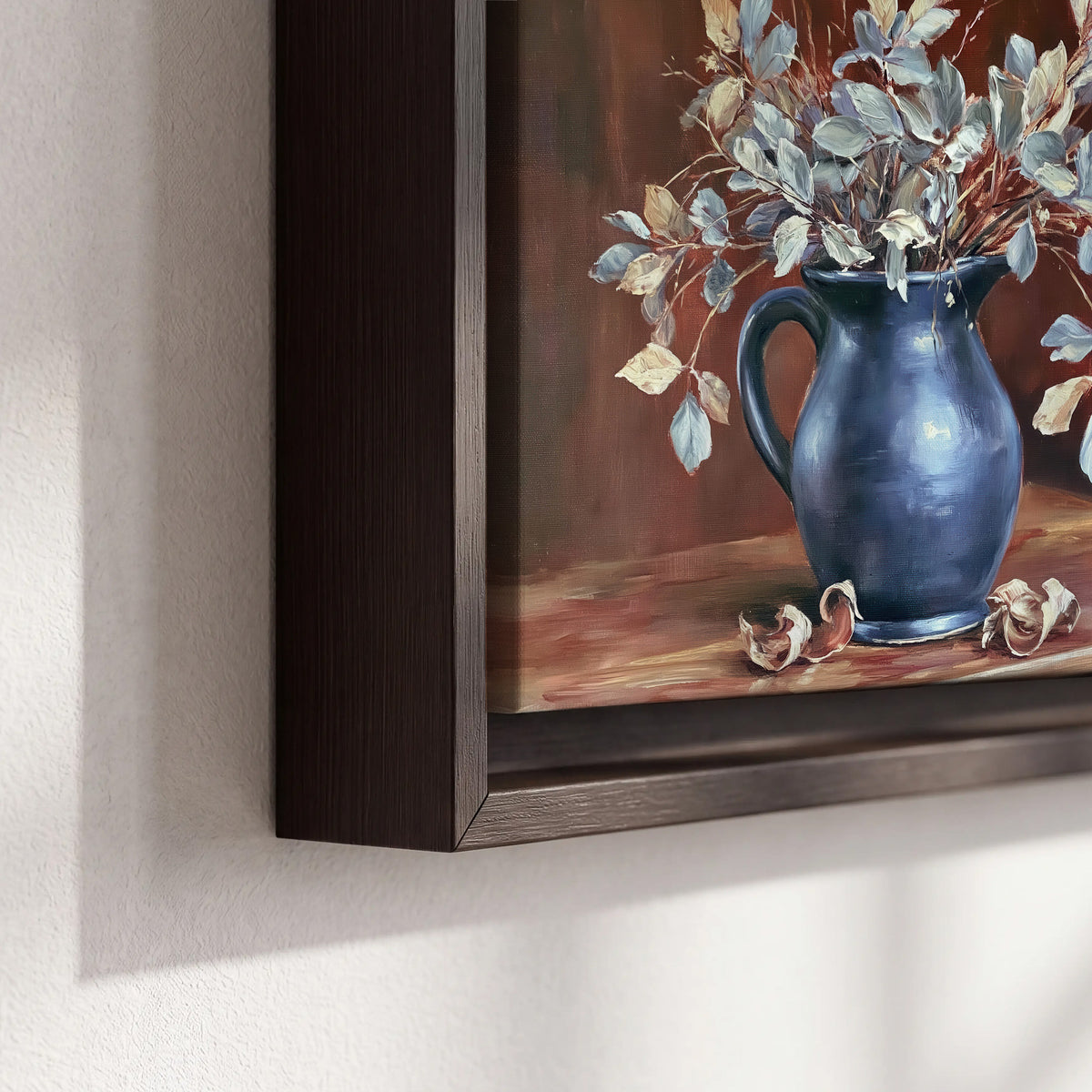 White flowering branches gathered in a deep blue pitcher against a warm rust-colored wall 3 piece framed canvas wall art material and edge close up