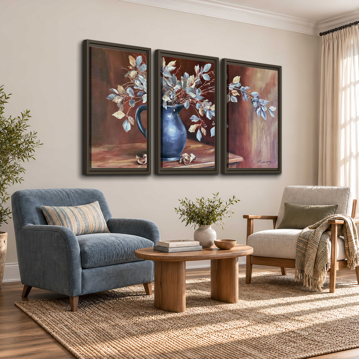 White flowering branches gathered in a deep blue pitcher against a warm rust-colored wall 3 piece framed canvas wall art styled in an interior