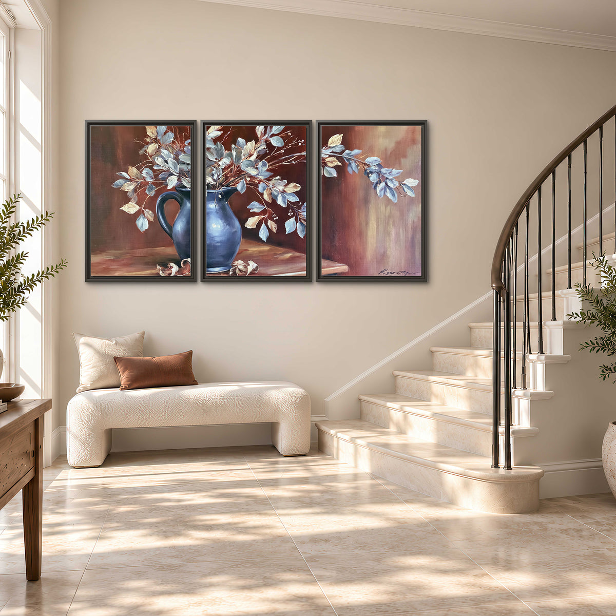 White flowering branches gathered in a deep blue pitcher against a warm rust-colored wall 3 piece framed canvas wall art styled in an interior