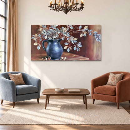 White flowering branches gathered in a deep blue pitcher against a warm rust-colored wall single canvas wall art styled in an interior