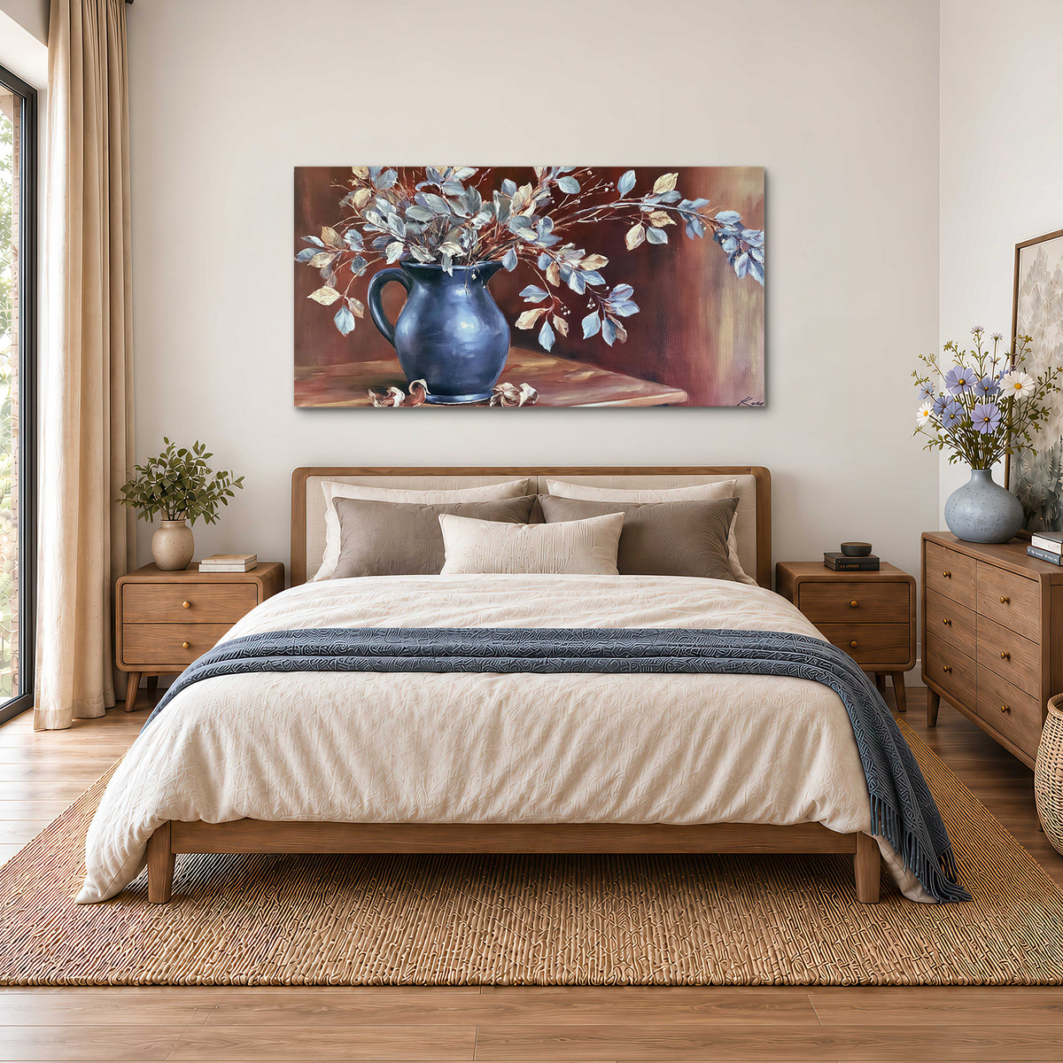 White flowering branches gathered in a deep blue pitcher against a warm rust-colored wall single canvas wall art styled in an interior