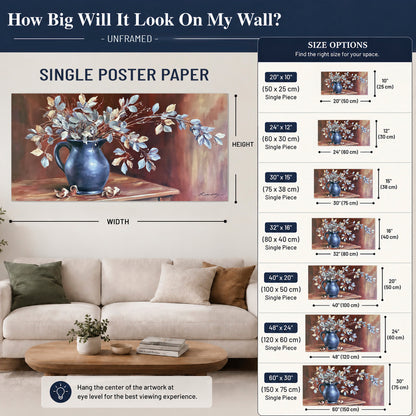 White flowering branches gathered in a deep blue pitcher against a warm rust-colored wall single poster print size guide above a sofa; room view is illustrative