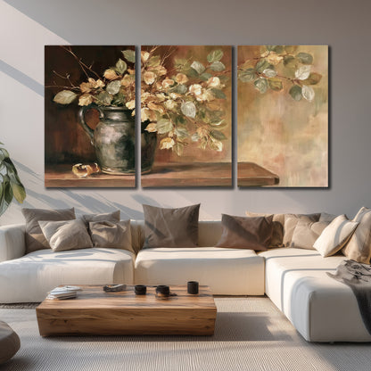Pale golden blossoms and leaves in a dark green vase on a wooden ledge 3 piece canvas wall art displayed in a living room