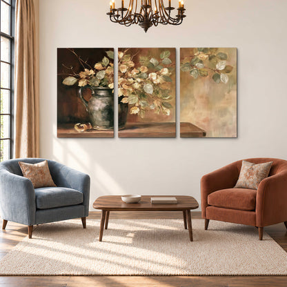 Pale golden blossoms and leaves in a dark green vase on a wooden ledge 3 piece canvas wall art styled in an interior
