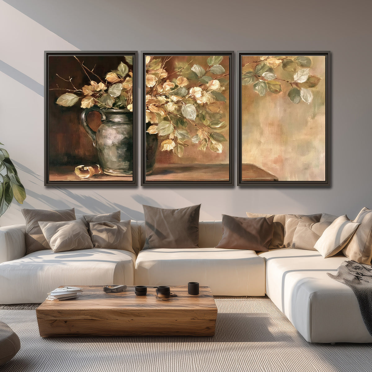 Pale golden blossoms and leaves in a dark green vase on a wooden ledge 3 piece framed canvas wall art displayed in a living room