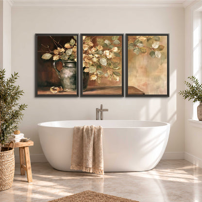 Pale golden blossoms and leaves in a dark green vase on a wooden ledge 3 piece framed canvas wall art styled in an interior