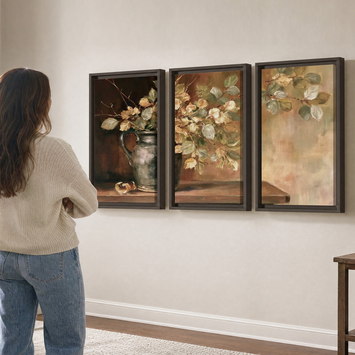 Pale golden blossoms and leaves in a dark green vase on a wooden ledge 3 piece framed canvas wall art three panel arrangement on a wall