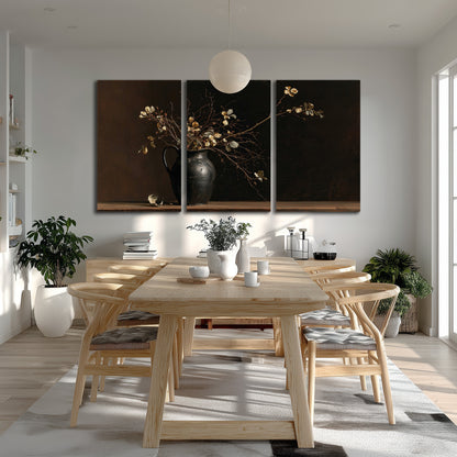 Fine flowering branches in a small dark vase on a wooden table against a deep brown background 3 piece canvas wall art room and product view