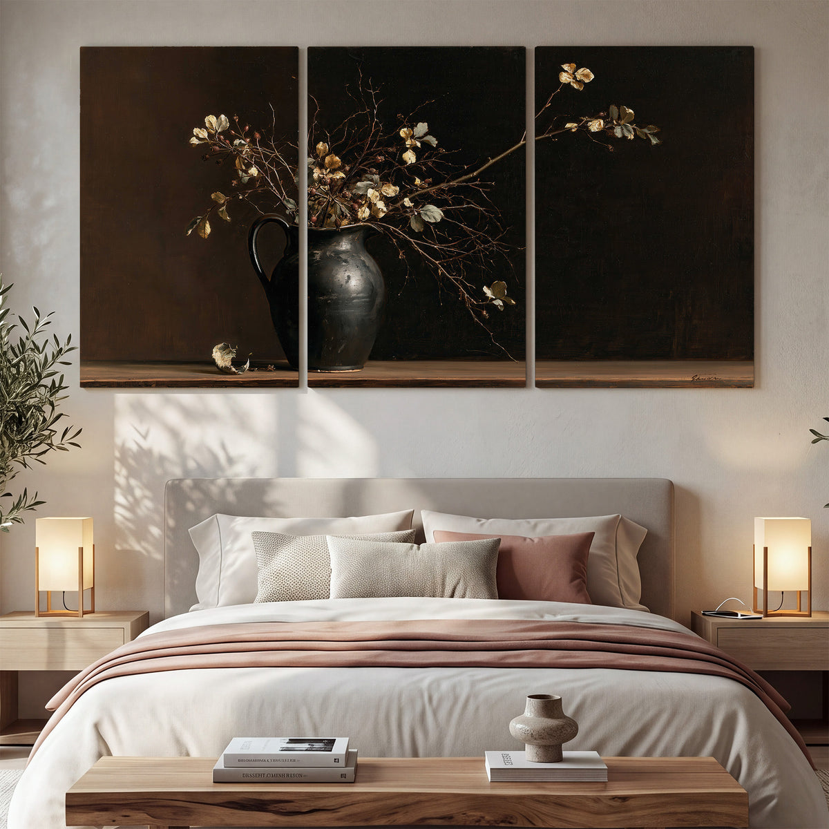 Fine flowering branches in a small dark vase on a wooden table against a deep brown background 3 piece canvas wall art displayed in a bedroom
