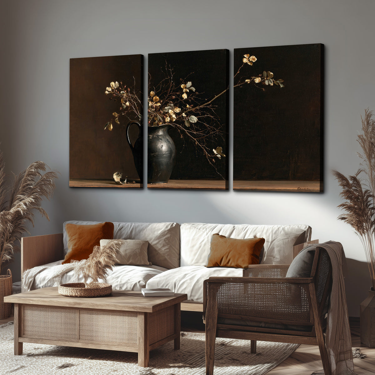 Fine flowering branches in a small dark vase on a wooden table against a deep brown background 3 piece canvas wall art displayed in a rustic living room