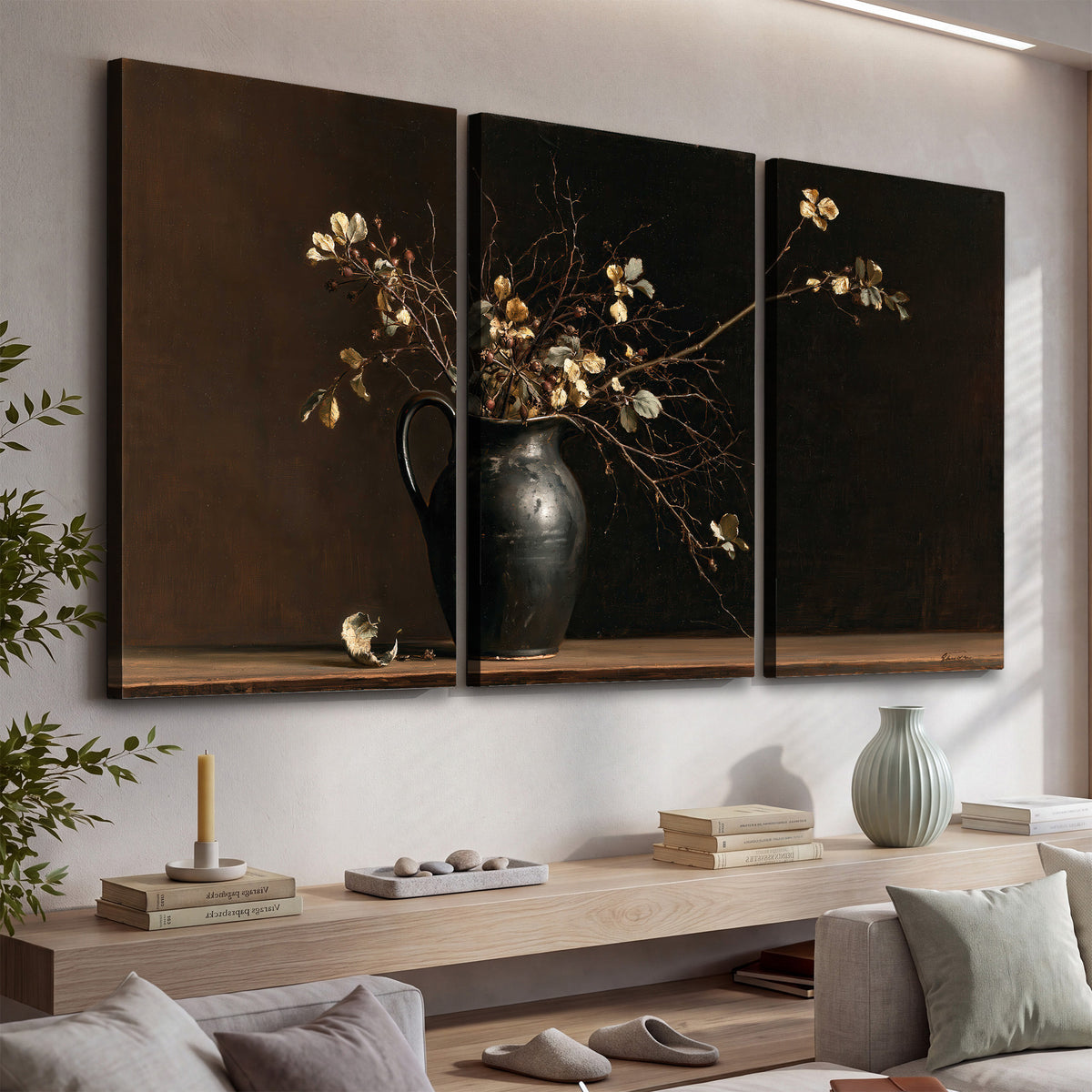 Fine flowering branches in a small dark vase on a wooden table against a deep brown background 3 piece canvas wall art displayed in a console