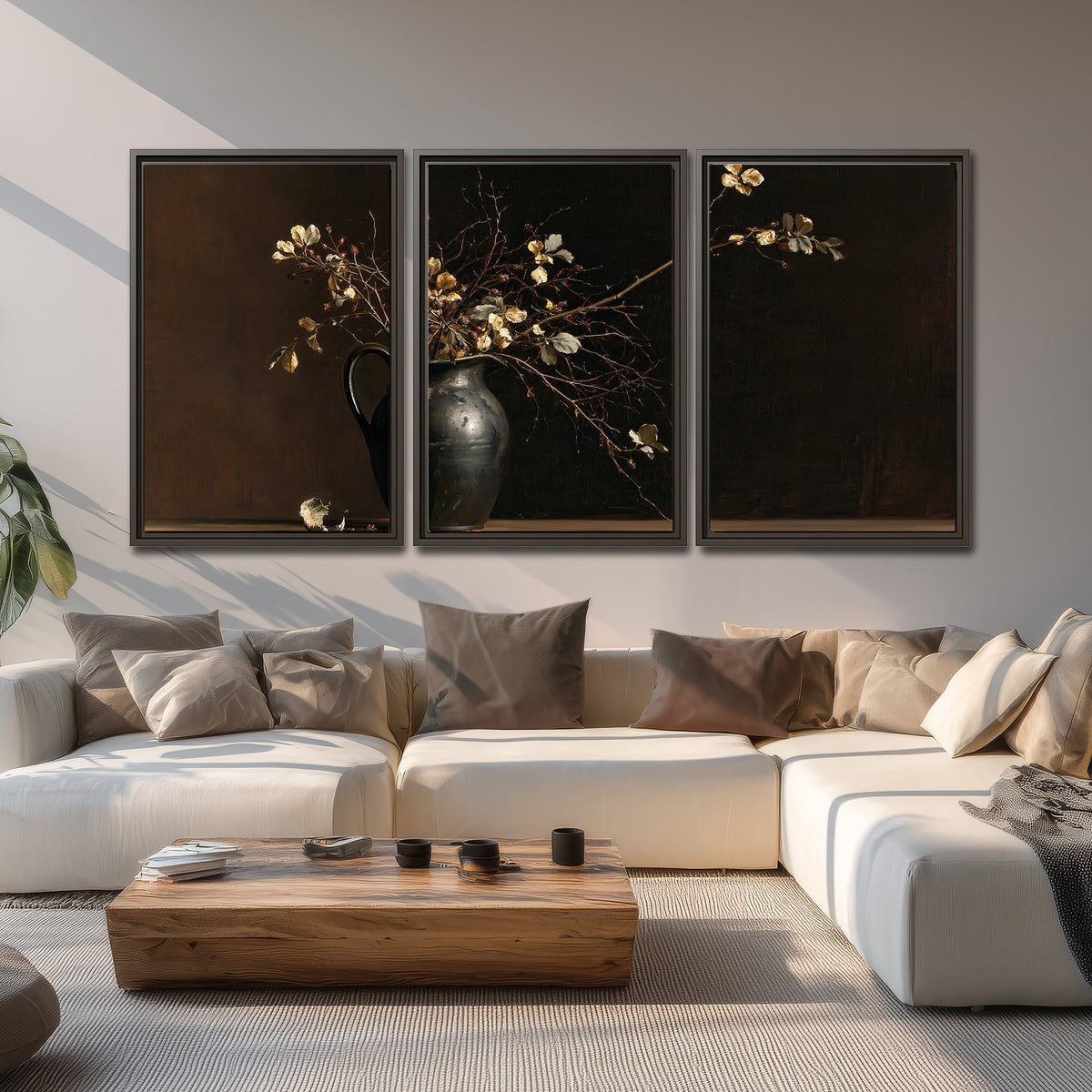 Fine flowering branches in a small dark vase on a wooden table against a deep brown background 3 piece framed canvas wall art displayed in a living room
