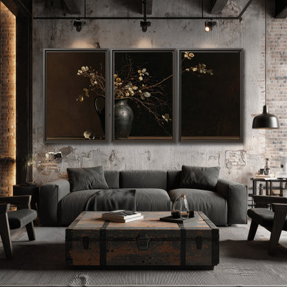Fine flowering branches in a small dark vase on a wooden table against a deep brown background 3 piece framed canvas wall art displayed in a industrial room