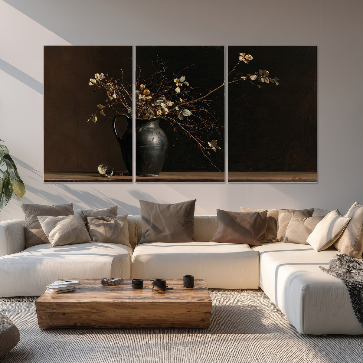 Fine flowering branches in a small dark vase on a wooden table against a deep brown background set of 3 poster prints displayed in a living room