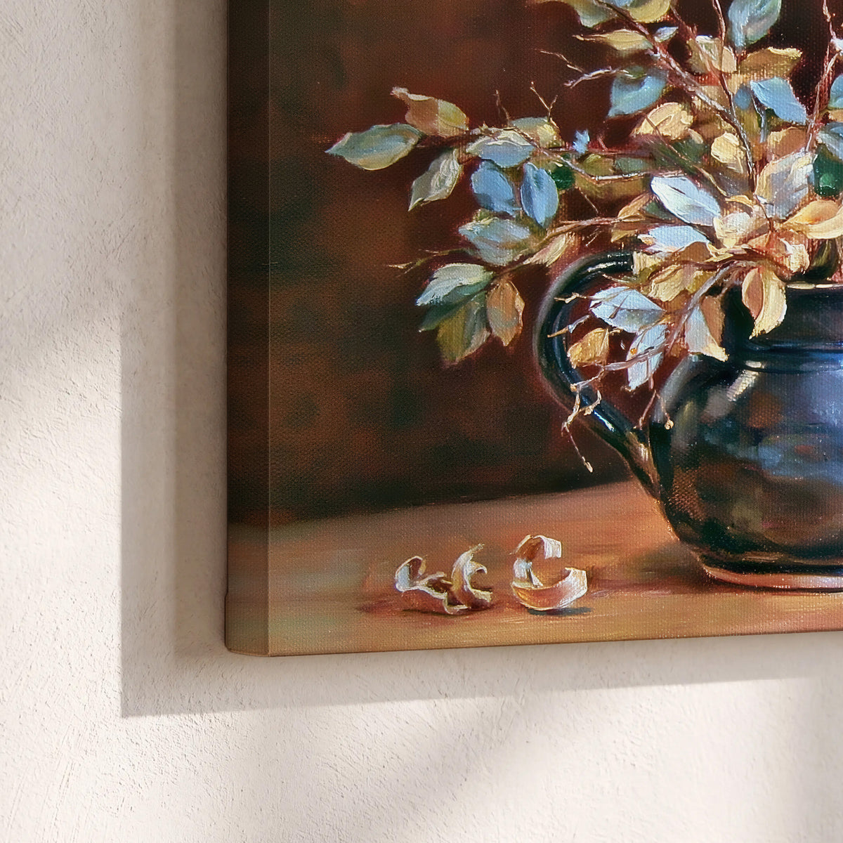 White and peach flowering branches arranged in a blue vase against a warm ochre background 3 piece canvas wall art material and edge close up