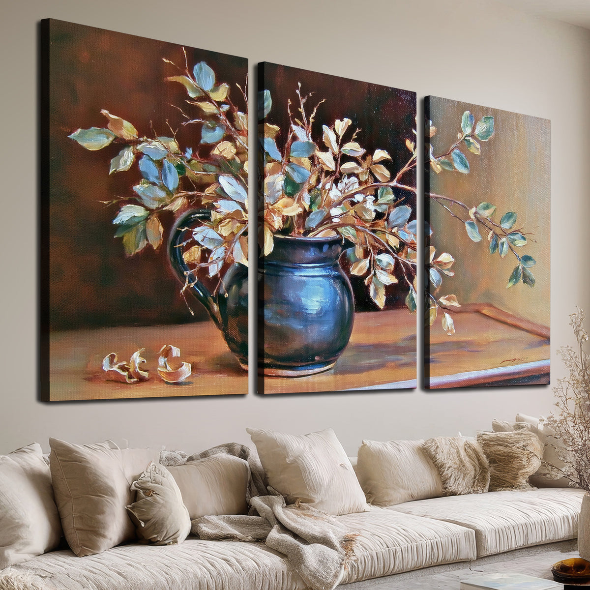 White and peach flowering branches arranged in a blue vase against a warm ochre background 3 piece canvas wall art room and product view