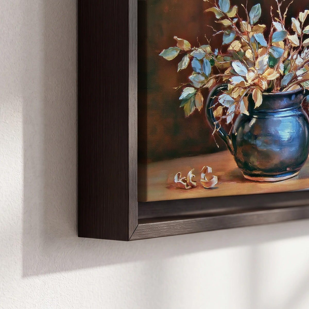 White and peach flowering branches arranged in a blue vase against a warm ochre background 3 piece framed canvas wall art material and edge close up
