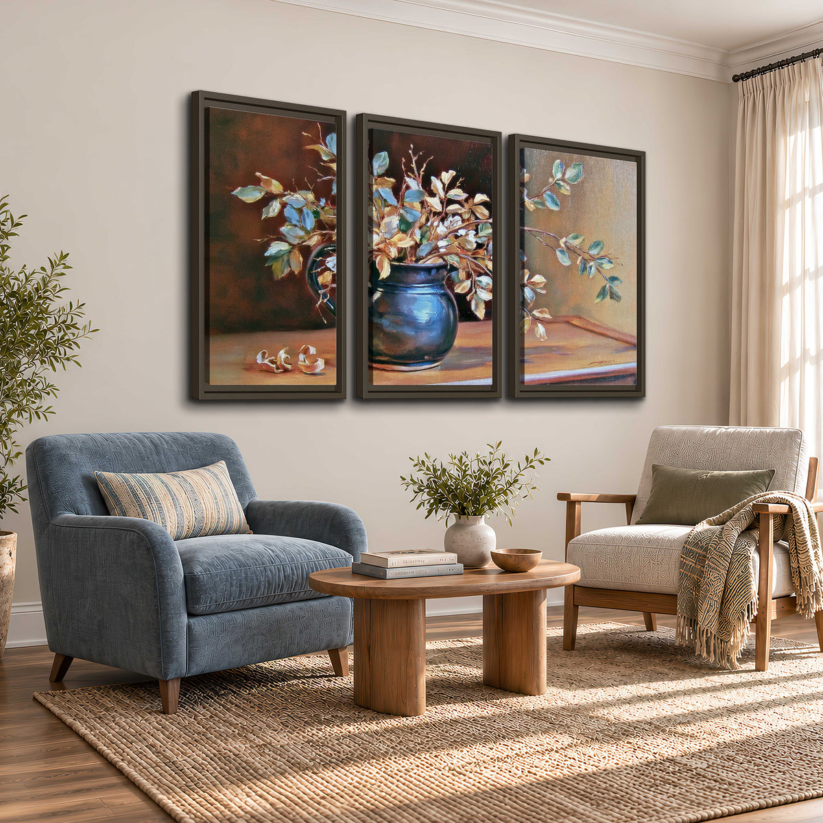 White and peach flowering branches arranged in a blue vase against a warm ochre background 3 piece framed canvas wall art styled in an interior