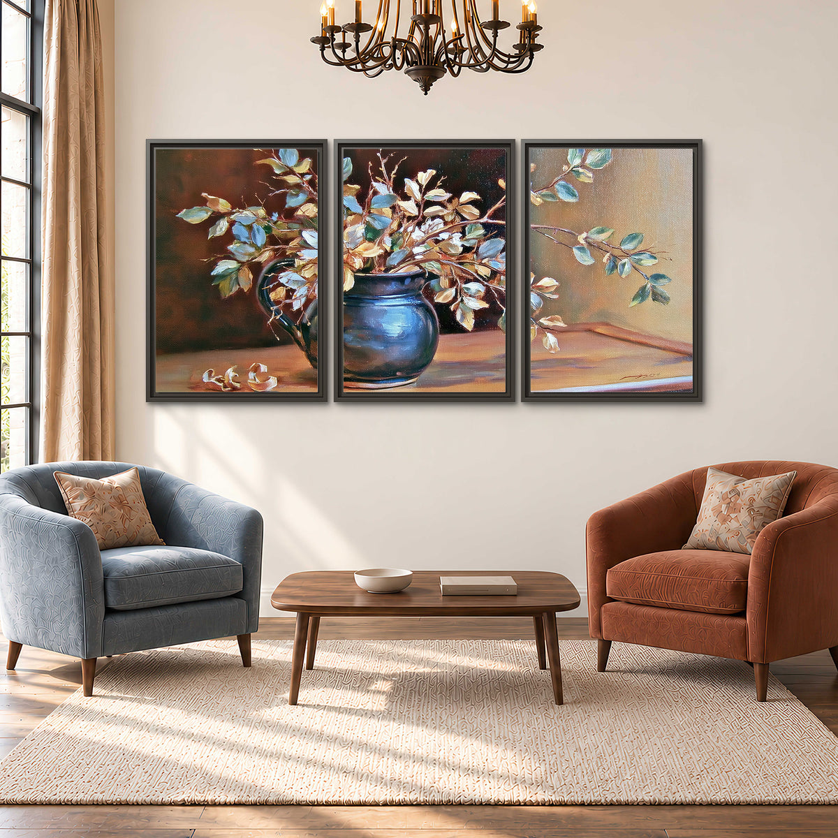 White and peach flowering branches arranged in a blue vase against a warm ochre background 3 piece framed canvas wall art styled in an interior