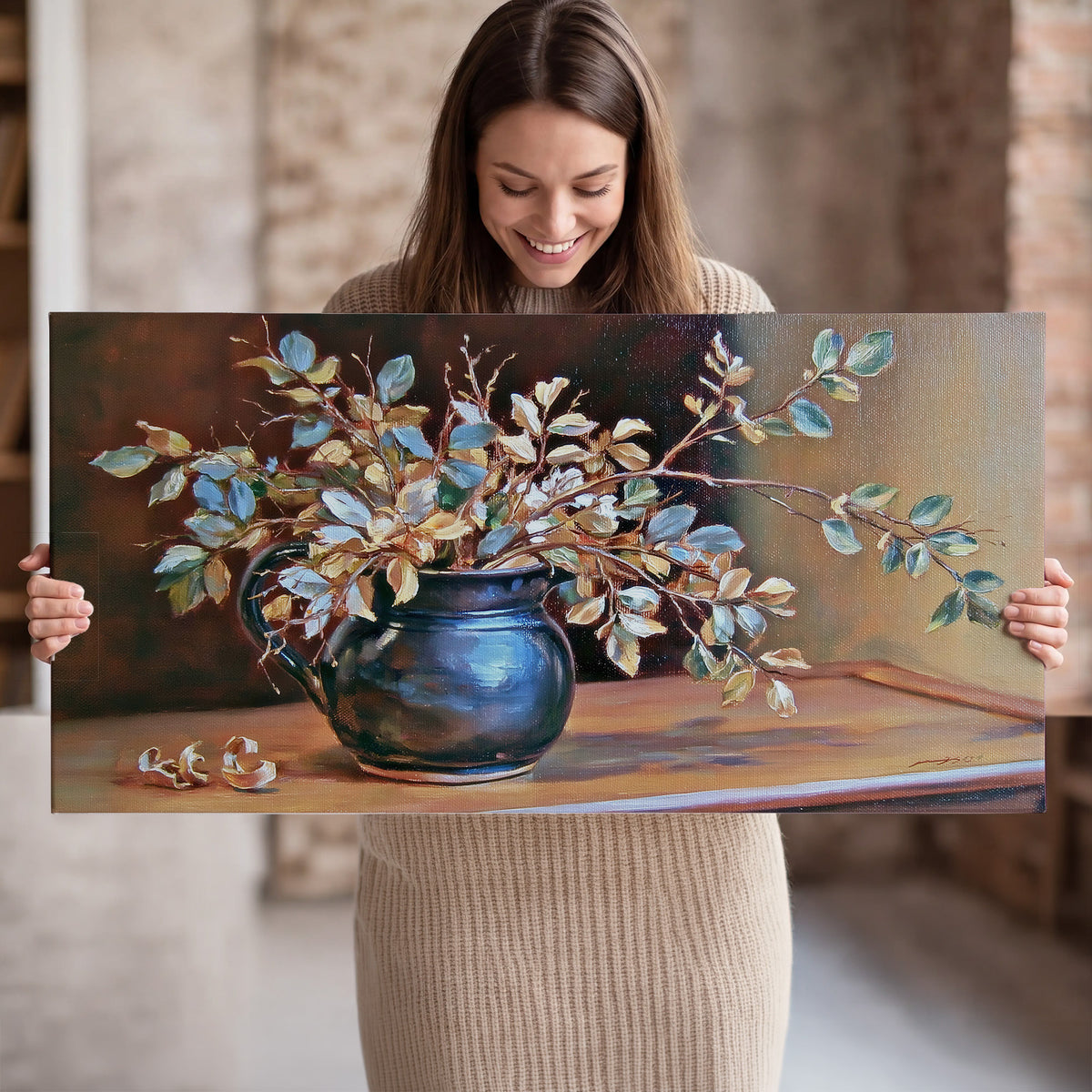 White and peach flowering branches arranged in a blue vase against a warm ochre background single canvas wall art held in hands