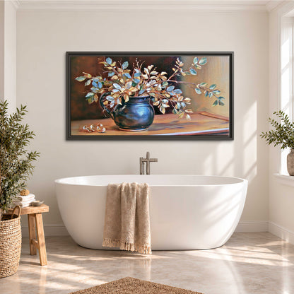 White and peach flowering branches arranged in a blue vase against a warm ochre background single framed canvas wall art styled in an interior
