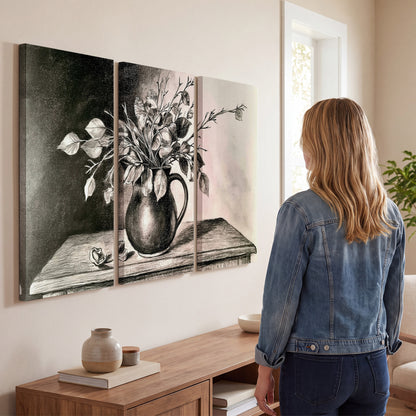 Leafy flowering branches in a rounded pitcher rendered in expressive charcoal-style strokes 3 piece canvas wall art three panel arrangement on a wall