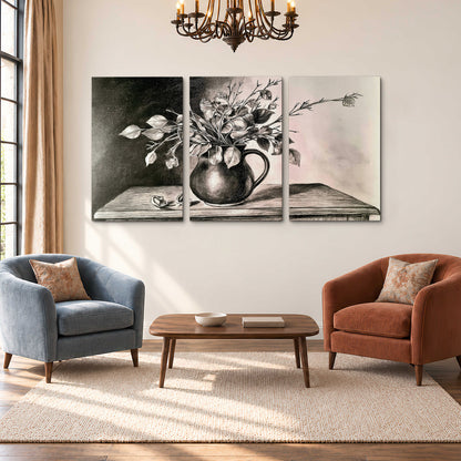 Leafy flowering branches in a rounded pitcher rendered in expressive charcoal-style strokes 3 piece canvas wall art styled in an interior