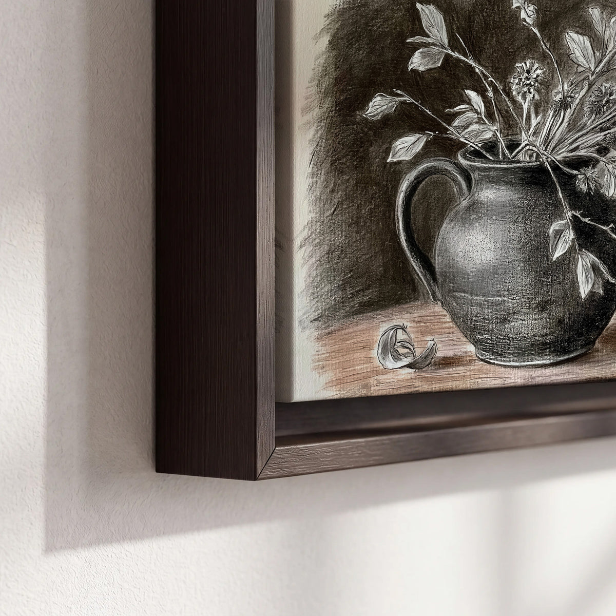 Fine leafy branches spilling from a dark rounded vase in a soft monochrome still life 3 piece framed canvas wall art material and edge close up