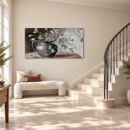 Fine leafy branches spilling from a dark rounded vase in a soft monochrome still life single canvas wall art styled in an interior