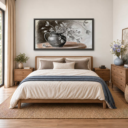 Fine leafy branches spilling from a dark rounded vase in a soft monochrome still life single framed canvas wall art styled in an interior