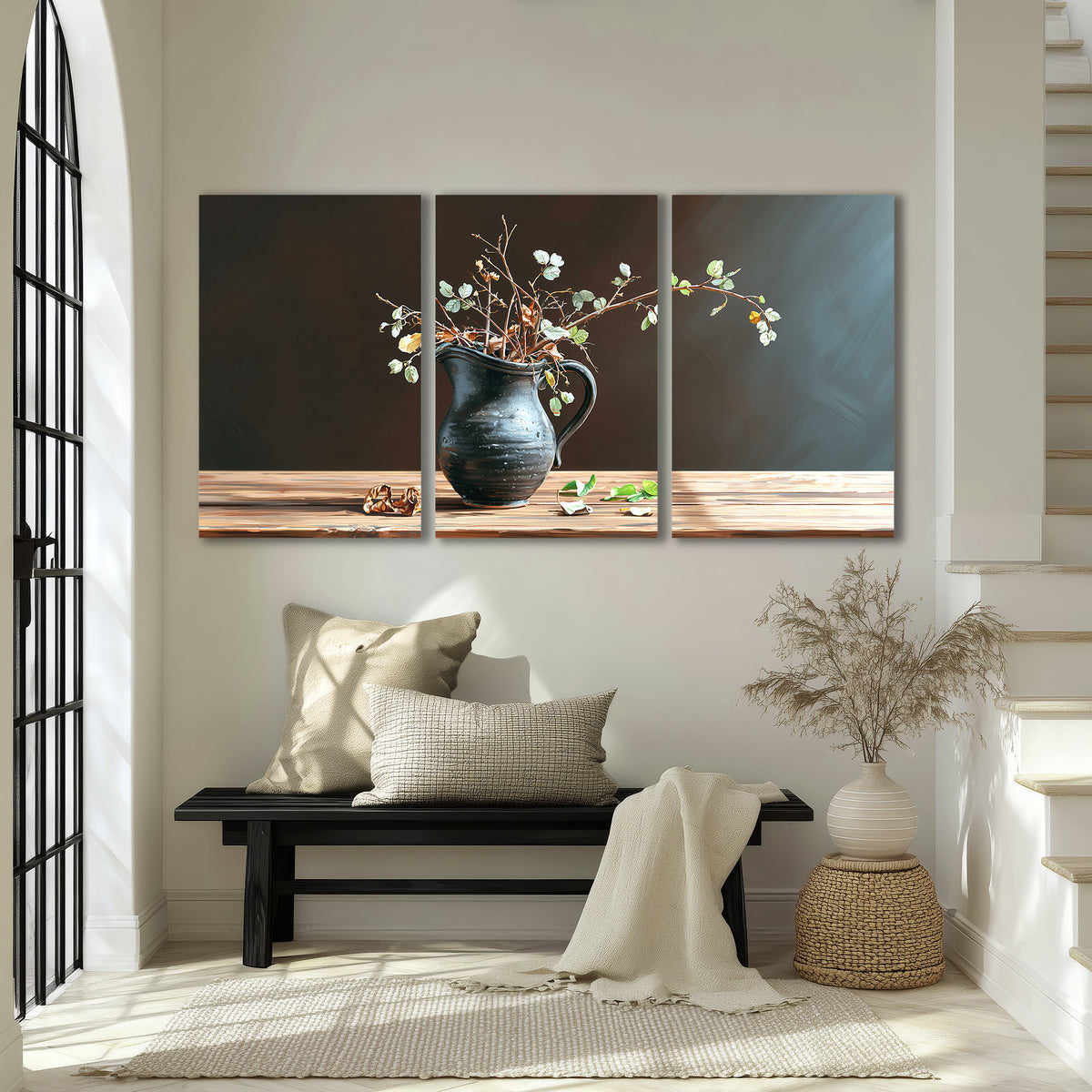 A delicate arrangement of pale blossoms in a blue vase on a sunlit wooden table 3 piece canvas wall art displayed in a entryway