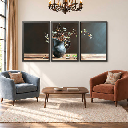 A delicate arrangement of pale blossoms in a blue vase on a sunlit wooden table 3 piece framed canvas wall art styled in an interior