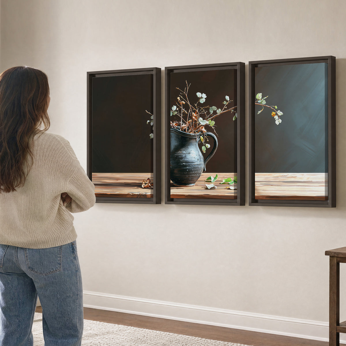 A delicate arrangement of pale blossoms in a blue vase on a sunlit wooden table 3 piece framed canvas wall art three panel arrangement on a wall
