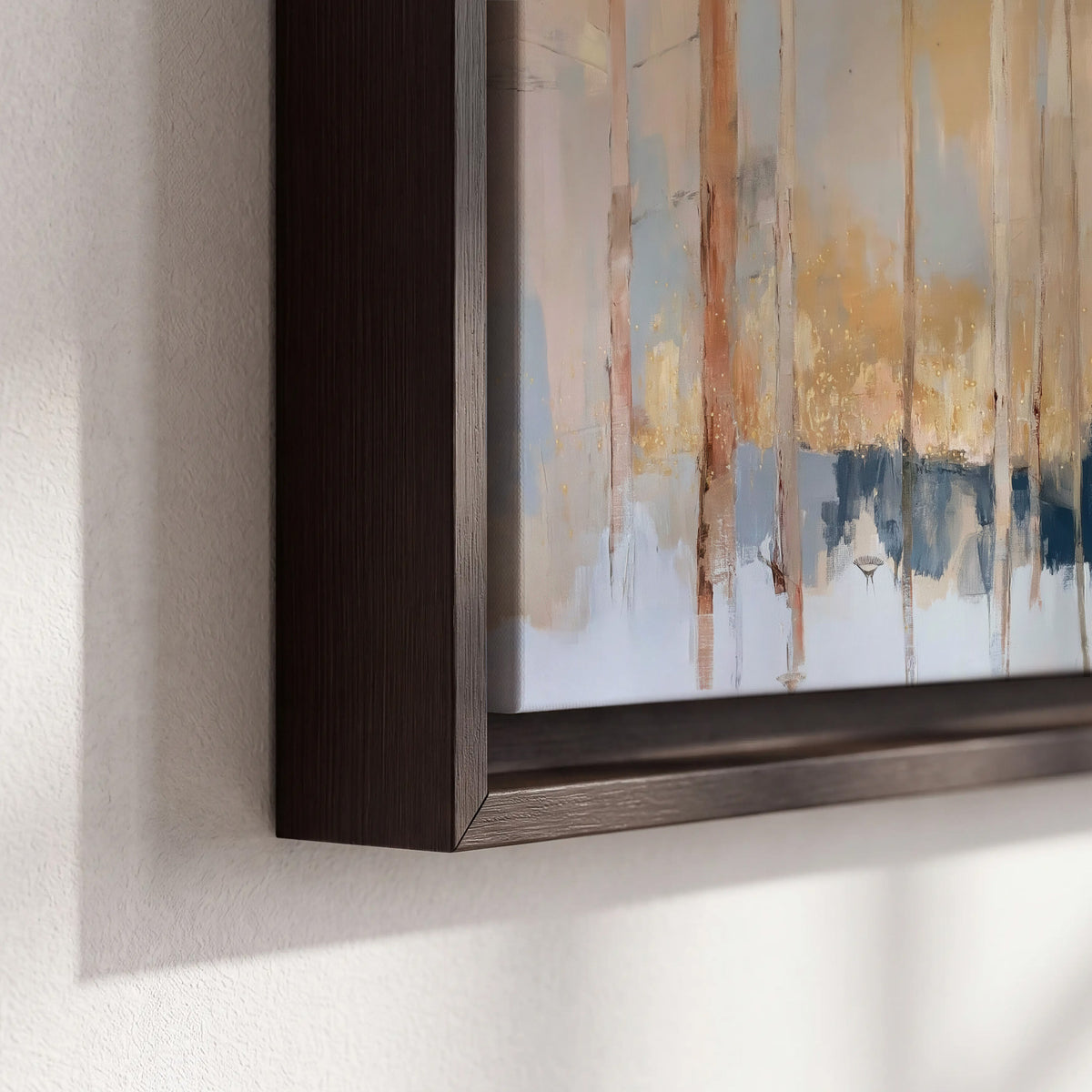 Vertical strokes of cream, blue and ochre suggesting a quiet woodland 3 piece framed canvas wall art material and edge close up