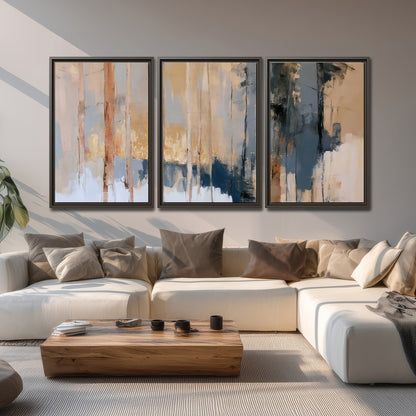 Vertical strokes of cream, blue and ochre suggesting a quiet woodland 3 piece framed canvas wall art displayed in a living room